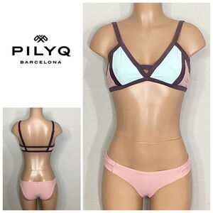 New. Pilyq blush/pink, brown, mint bikini. D-cup top/ S-bottom. Normally $168